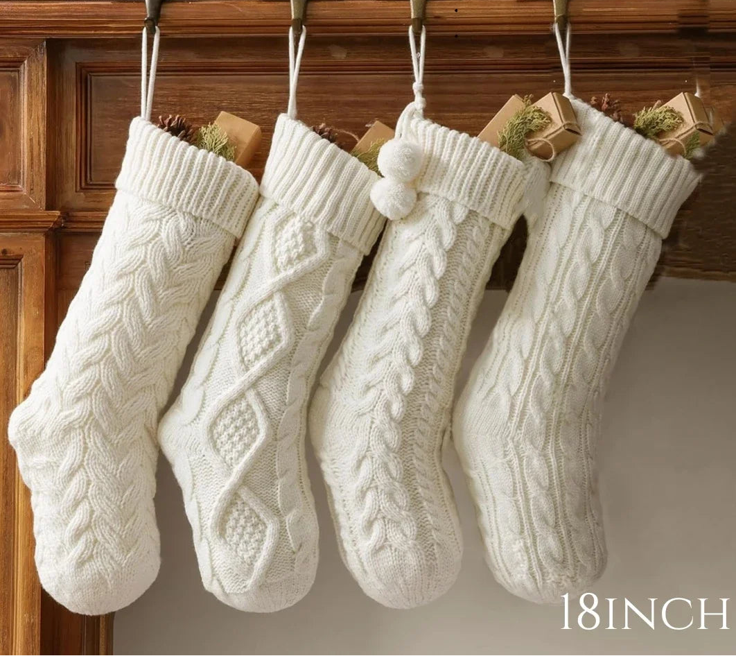  white knitted Christmas stockings 
