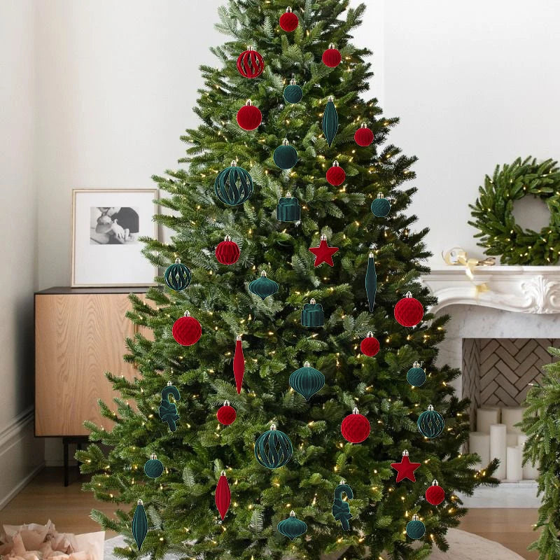 Decorated Christmas tree with red and green ornaments.