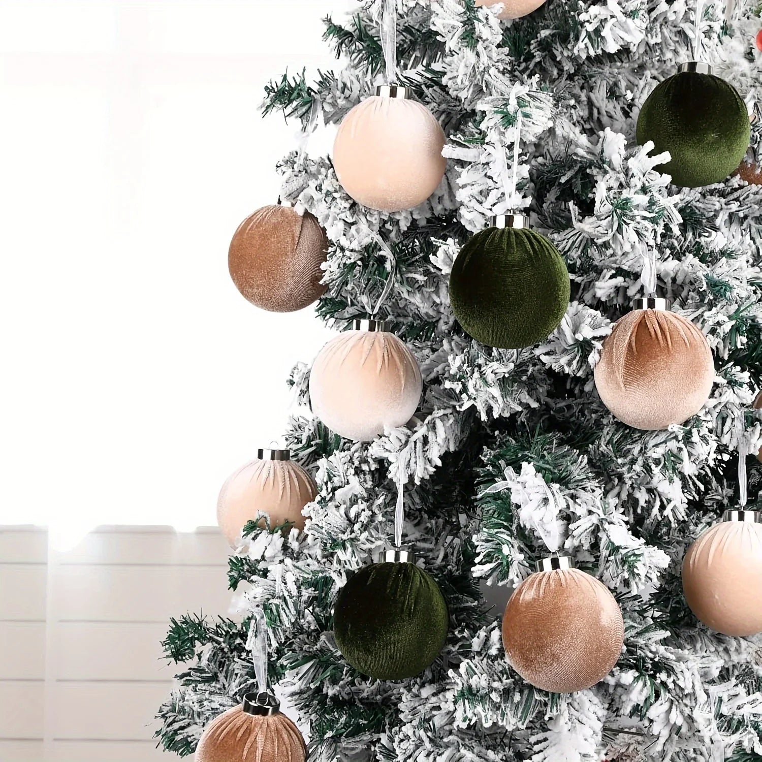 Decorative Christmas tree with brown, beige, and green velvet ornaments