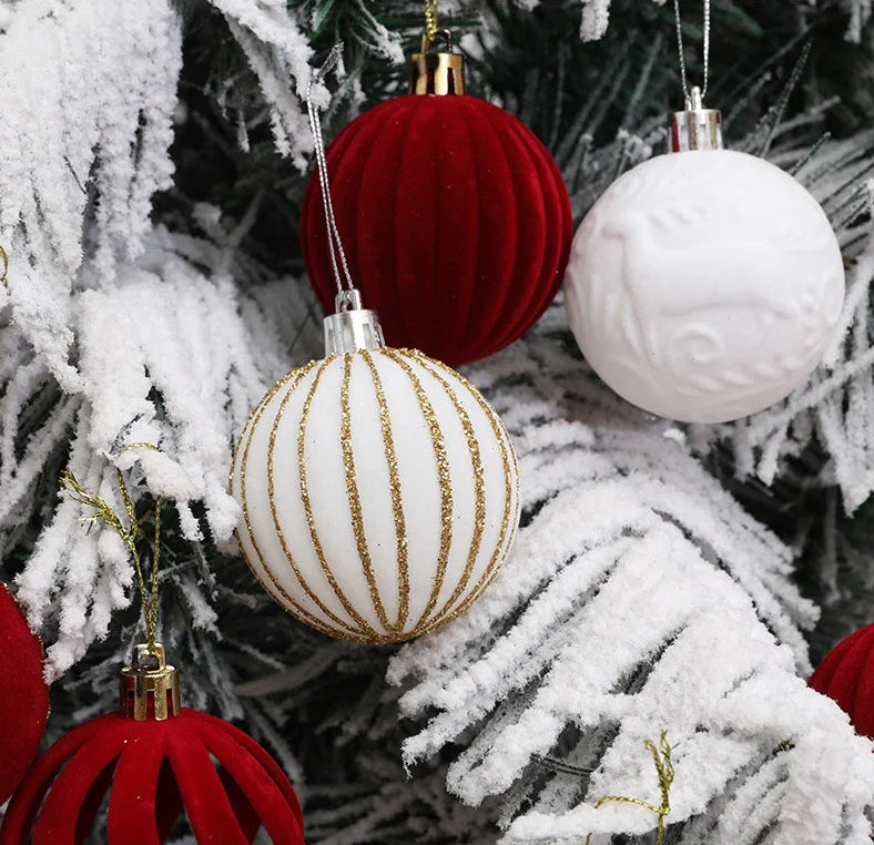 Decorative Christmas ornaments on a frosted tree