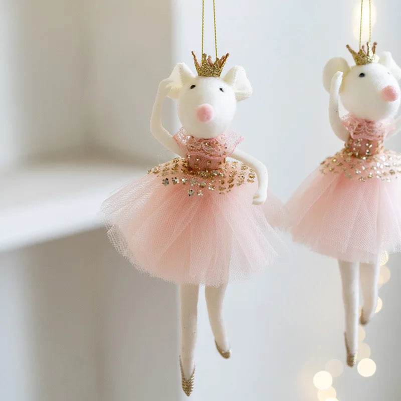 Two decorative mouse ornaments in pink tutus.