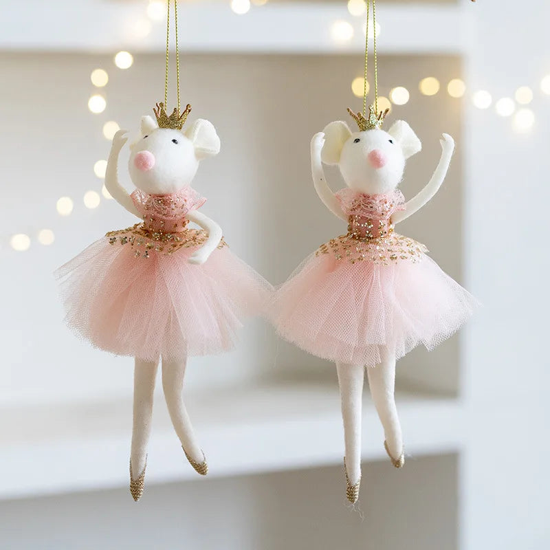 Two decorative mouse figurines in ballerina costumes
