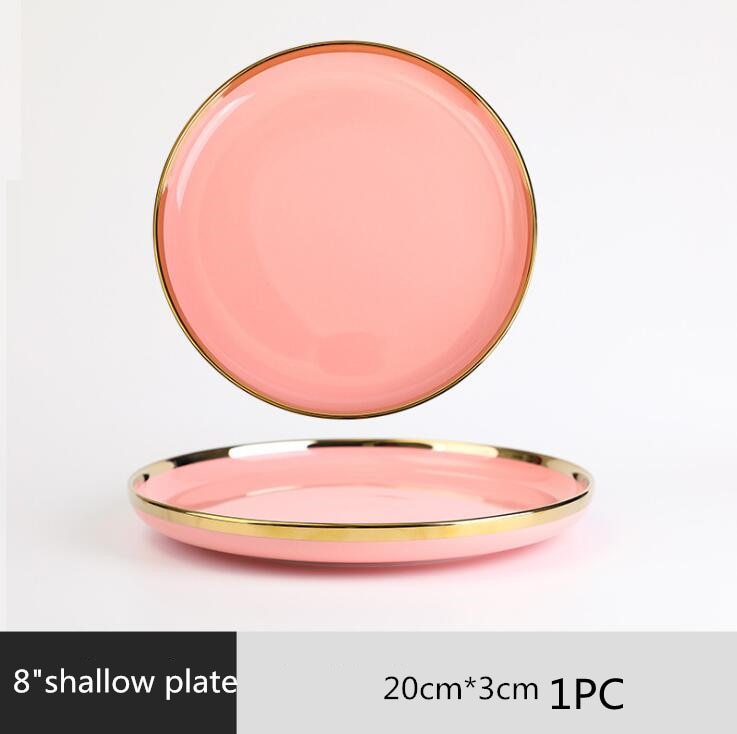 pink and gold dinner plate