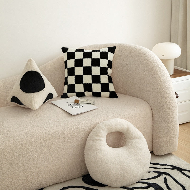 modern abstract shaped cushions on couch